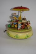 1950s German Automaton, featuring a market stall with figures of children, rotated by a musical