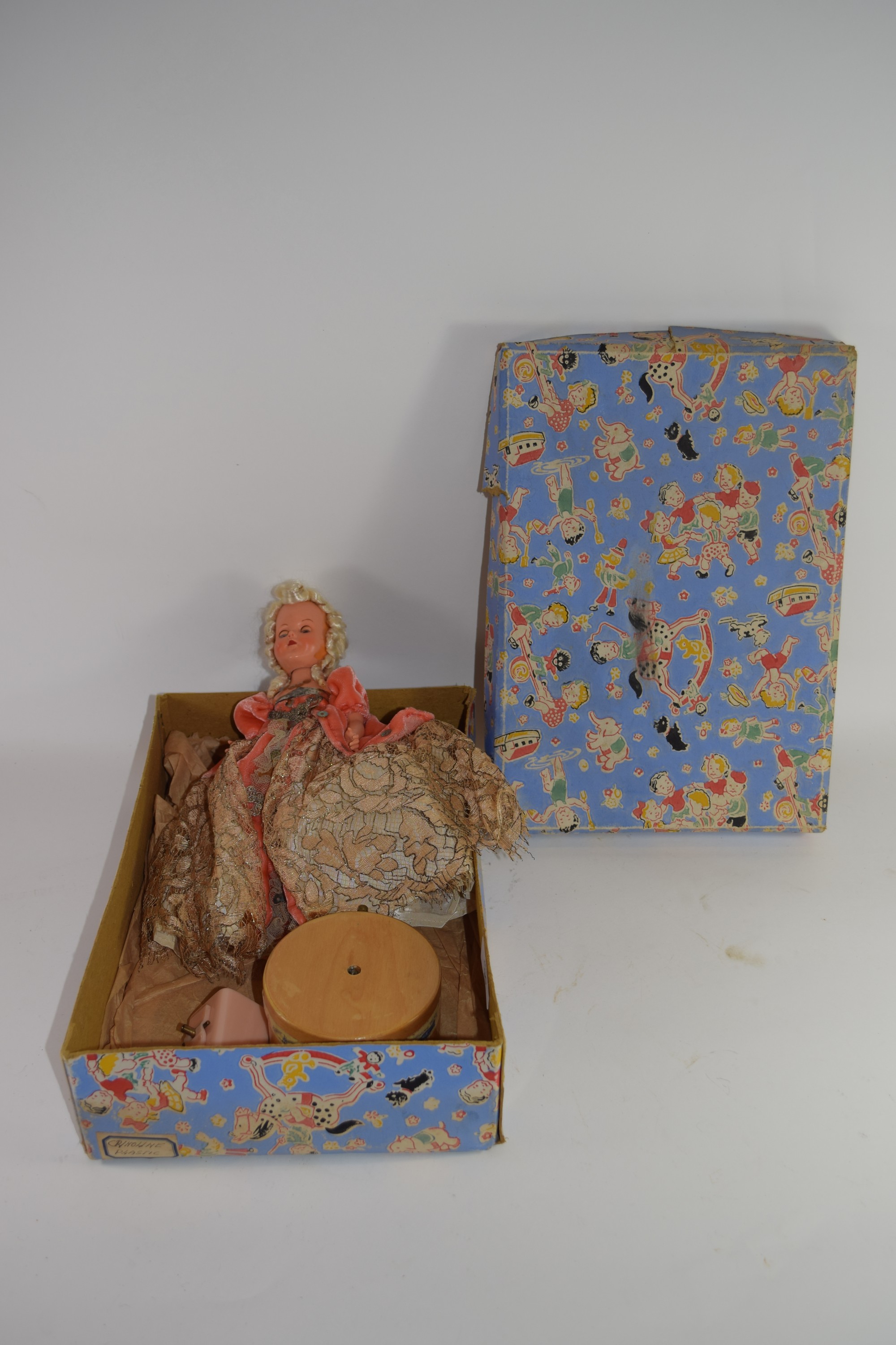 1950s/60s Doll, dressed in ornate ballgown, with music rotating stand, height incl stand approx - Image 2 of 2