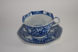 Chinese porcelain octagonal cup and saucer decorated in blue and white in Kangxi style with reign