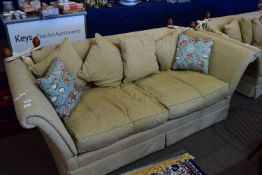 20th century Knole style two/three seater settee upholstered in beige fabric, having rope tied