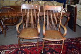 Pair of 19th century elm Windsor chairs with decorative turned supports to back and bentwood arms,