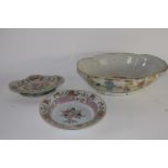 Group of Chinese porcelain wares decorated in enamels in famille rose palette comprising a shaped