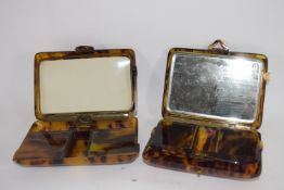 Two vintage composition vanity sets in the form of cigar cases (2)