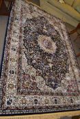 Rich blue ground full pile Turkish Carpet, with floral medallion design 320cm x 200cm approximately