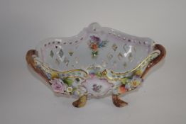 Continental porcelain flower basket with floral encrusted decoration and blue crossed marks to base,