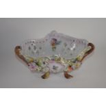 Continental porcelain flower basket with floral encrusted decoration and blue crossed marks to base,