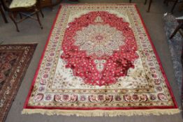 Red ground Kashmir floral medallion design Rug, 240 x 156cm approximately