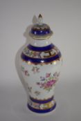Dresden porcelain vase with armorial device to the centre and floral decoration, the cover with