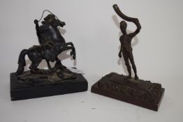 Two bronzed metal sculptures, one of a Hussar on rectangular base, the other of a Roman warrior with