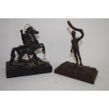 Two bronzed metal sculptures, one of a Hussar on rectangular base, the other of a Roman warrior with