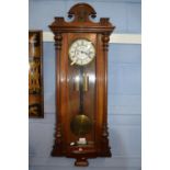 Vienna type wall clock of typical form in decoratively carved mahogany case, the dial signed GB,
