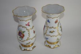 Pair of Continental porcelain Dresden style vases decorated with flowers in Meissen style, picked