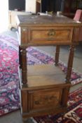 Late Victorian walnut bedside stand with inset veined marble top above a single drawer, open section