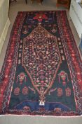 Vintage red ground Persian Tabreeze Carpet, bespoke medallion design surrounded by blue border 318c