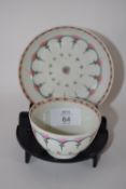 Lowestoft porcelain tea bowl and saucer with polychrome design in the Bungay pattern (hairlines to