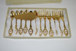 boxed set of gold plated Cake Cutlery each inset with porcelain floral panel