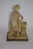 Italian resin figure on wooden base