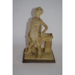 Italian resin figure on wooden base