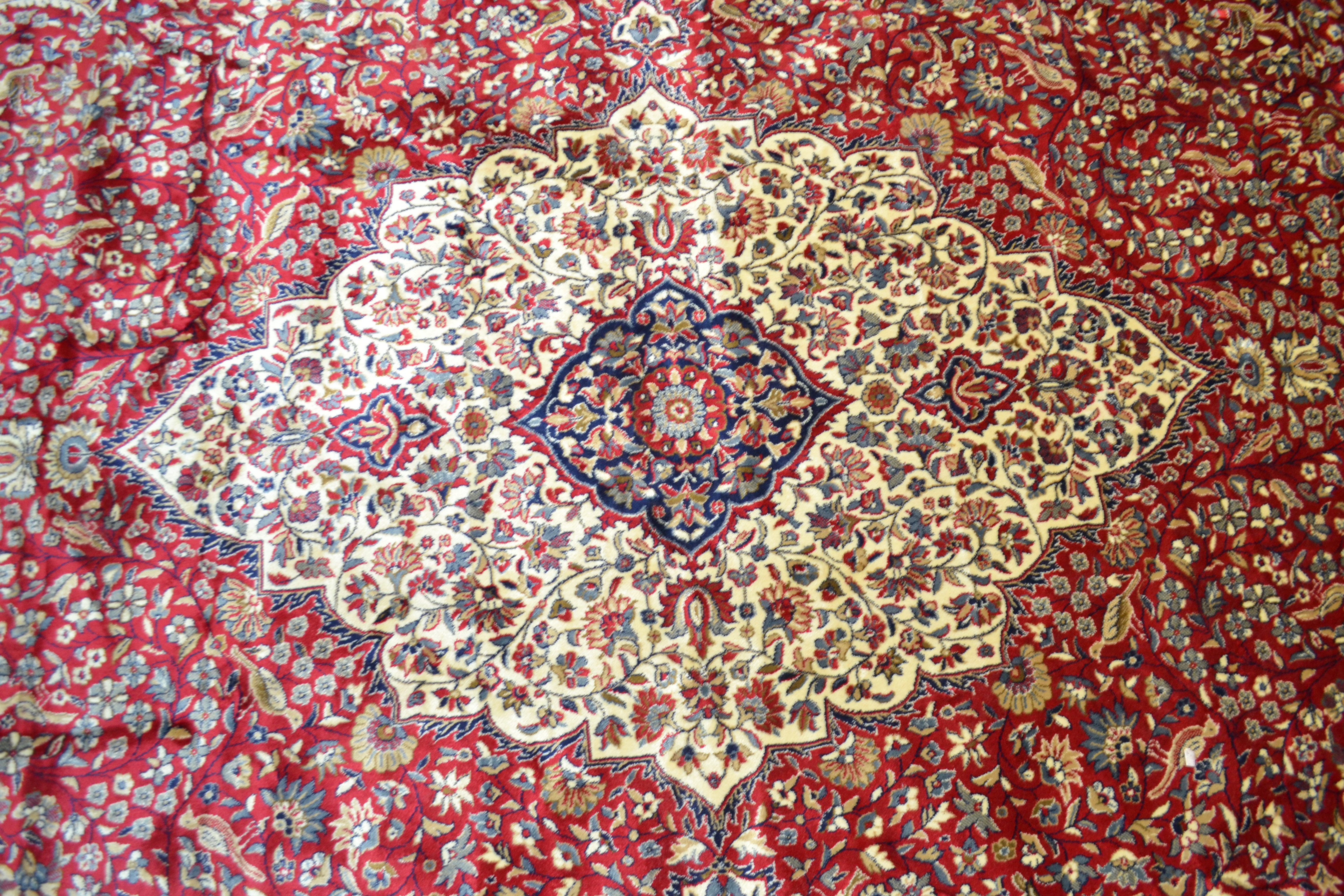 Large red ground full-pile Kashmir Carpet, floral medallion design, 340cm x 230 cm approximately - Image 2 of 2