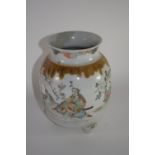 Japanese porcelain vase on three stud feet decorated with Samurai in a landscape setting with