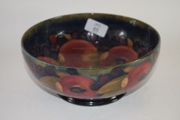 Moorcroft early 20th century fruit bowl decorated with the pomegranate pattern, with blue