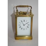 Good quality brass and glass cased Carriage Clock