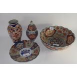 Group of Japanese porcelain with Imari designs comprising a shaped bowl, further small dish, a