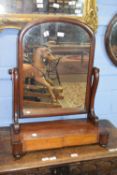 Victorian mahogany swing mirror of arched form raised on oval four, total width approx 61cm