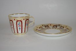 Mintons hand decorated cabinet Cup and Saucer with gilt trimmed floral decoration