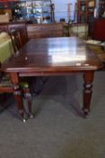 Early/mid Victorian small extending dining table of rectangular shape with rounded corners, raised