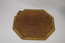 Robert Thompson mouseman chopping board of octagonal form with carved mouse to one side