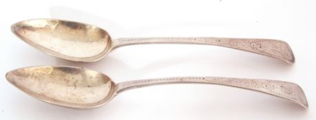 Pair of George III silver Old English table spoons, bright cut decoration and both bearing a