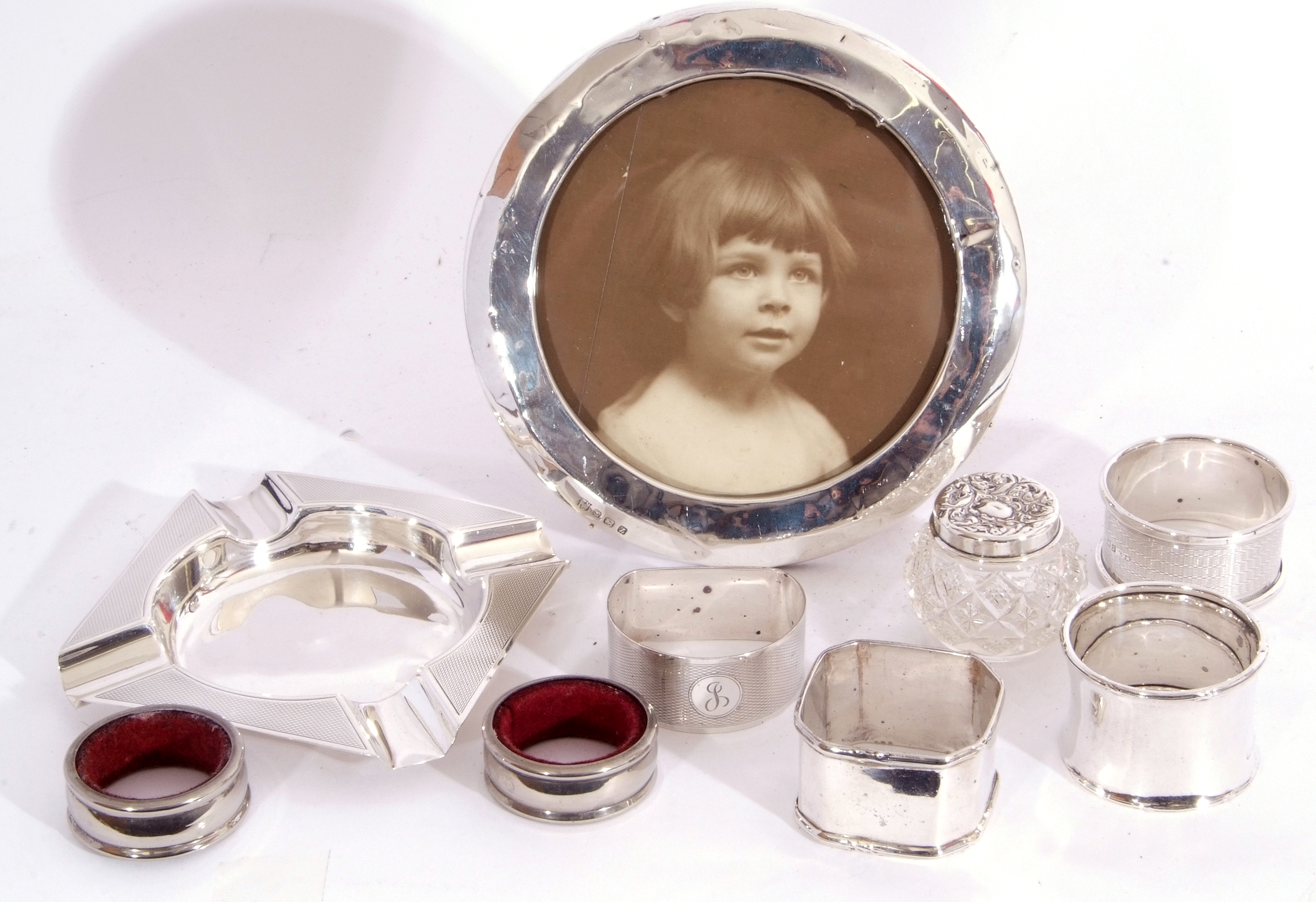 Mixed Lot: circular silver mounted photograph frame with wooden back (lacking easel mount), diam