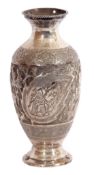 19th century Persian white metal vase heavily chased and embossed with a continuous scene of