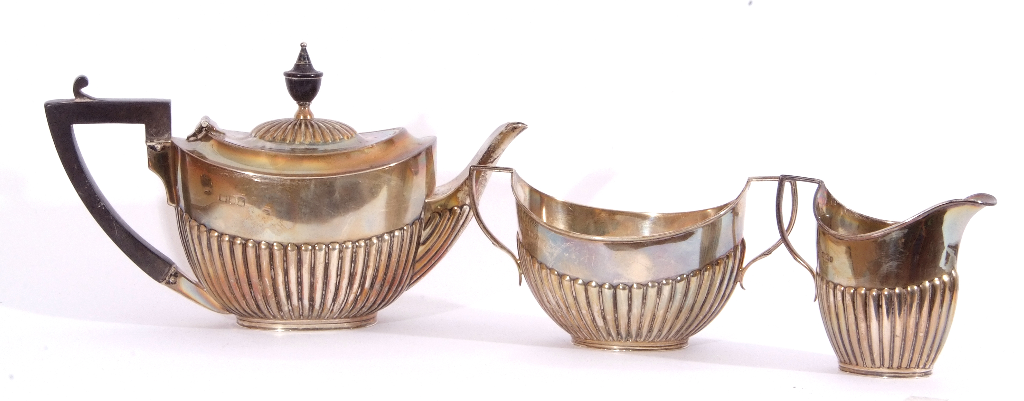 Bachelor's three piece silver tea service of oval form, half fluted bodies and angular handles, - Image 2 of 2
