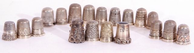 Interesting collection of 12 hallmarked silver plain/decorative thimbles mainly early 20th century