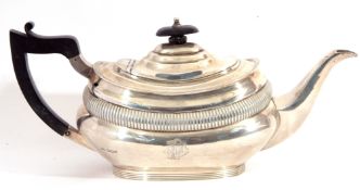 George V silver tea pot of compressed oval form with reeded borders, gadrooned decorated body,