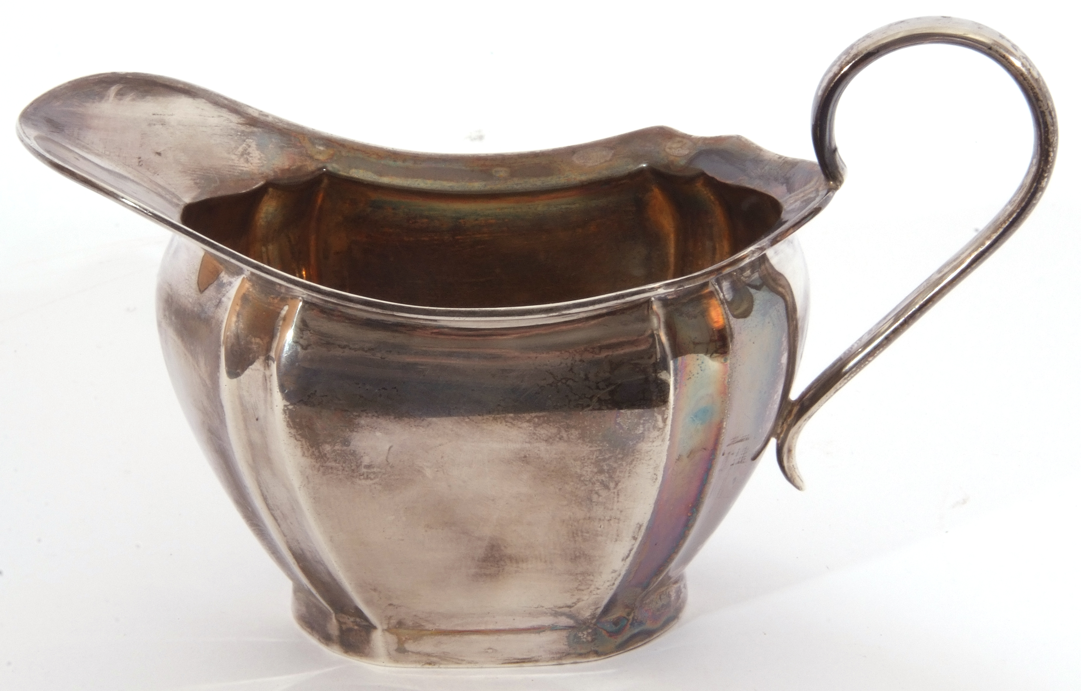 George V silver cream jug of oval form, scroll handled with reeded wavy rim, fluted body to a - Image 3 of 3