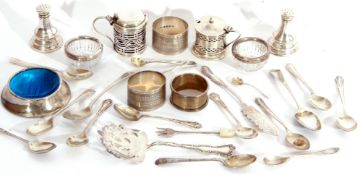 Collection of hallmarked silver or silver mounted raised and flatwares including three serviette