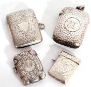 Mixed Lot: four hallmarked silver vesta cases - the first of curved rectangular form with all over