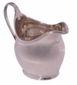 George III silver cream jug of oval belly form, reeded rim and handle, on a plain foot, 10 x 11cm,