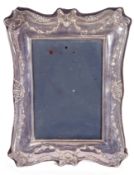 Elizabeth II silver photograph frame, 20 x 15.5cm, decorated with tied ribbons and floral