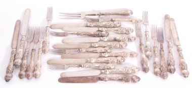 Twelve pairs of Victorian silver plated fruit knives and forks with decorative grapevine embossed