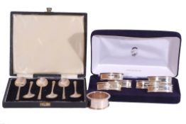 Mixed Lot: cased set of six Elizabeth II napkin rings of engraved oval form, 5cm wide, London 1995