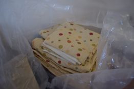 BAG CONTAINING MODERN CURTAINS IN CREAM AND MULTI-COLOURED DOT DESIGN