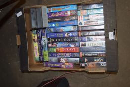 BOX CONTAINING VHS TAPES INCLUDING 007 THE WORLD IS NOT ENOUGH, TITANIC, FAWLTY TOWERS ETC