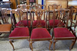 SET OF SIX MAHOGANY UPHOLSTERED DINING CHAIRS, EACH WITH ART NOUVEAU STYLE CARVING TO SPLAT, WIDTH