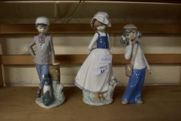 THREE LLADRO TYPE FIGURES OF CHILDREN