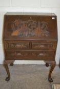 EASTERN HARDWOOD FALL FRONT BUREAU WITH PART FITTED INTERIOR AND HEAVILY CARVED DECORATIVE EXTERIOR,