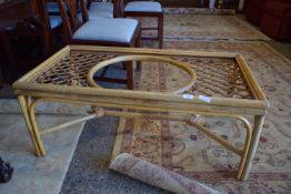 CANE CONSERVATORY COFFEE TABLE, (GLASS ABSENT) APPROX 56 X 107CM